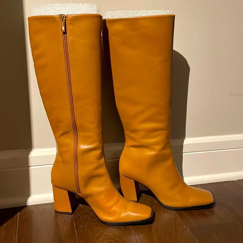 PERFECT Boot with Spring Skirts! From SAKS, in brown that matches with anything.